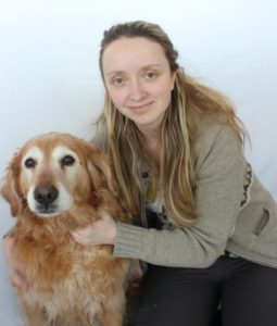 Staff member Megan Norrlinger with pet dog at Stretsville Animal Hospital